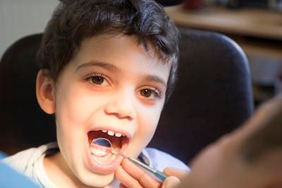 young child getting a dental checkup at Smile Team Pediatric Dentistry