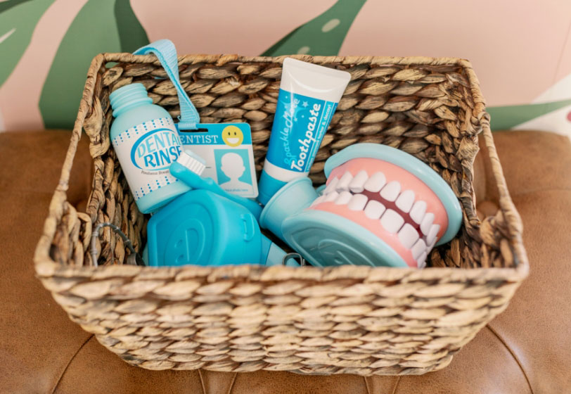 gift basket filled with children's dental toys at Smile Team Pediatric Dentistry